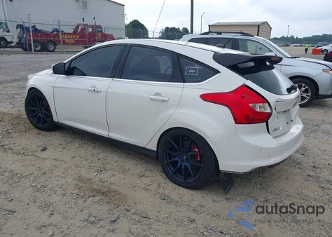 2012 Ford Focus Titanium z USA, uszkodzony, nr VIN 1FAHP3N21CL463011